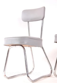 2 chaises vintage en acier tubulaire avec rembourrage à ressort